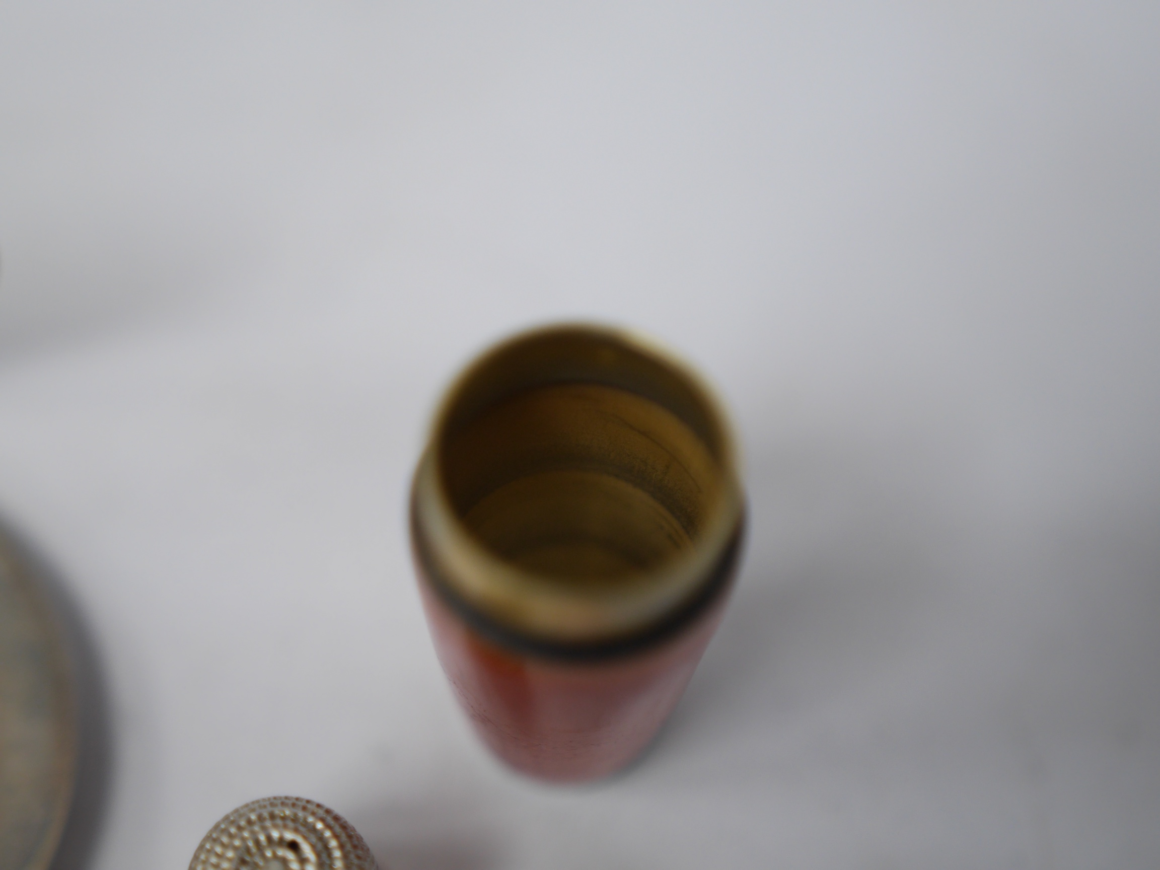 An Art Deco silver green guilloche enamel circular compact, Charles Packer & Co Ltd, Birmingham, 1938, 60mm, together with a Norwegian 925S and enamel spool and thimble holder(a.f.). Condition - poor to fair